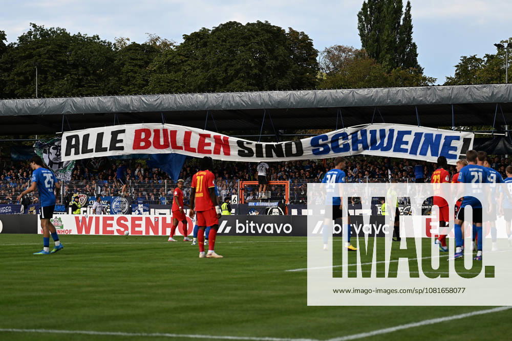 Soccer, DFB Cup First Round, Eintracht Trier vs. RB Leipzig, banner, fans, spectators, ultras, Eintracht Trier: All Cops Are Pigs Trier