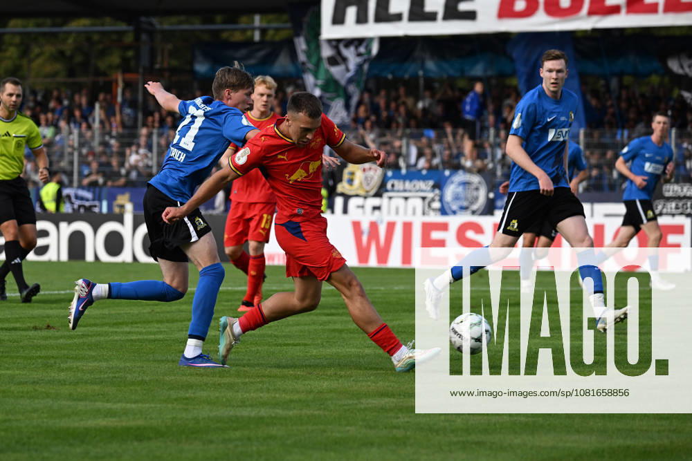 Soccer, DFB Cup First Round, Eintracht Trier vs. RB Leipzig, Elia Dittrich, SV Eintracht Trier 05, Brajan Gruda, RB Leipzig, tackle, action, battle for the ball, Trier