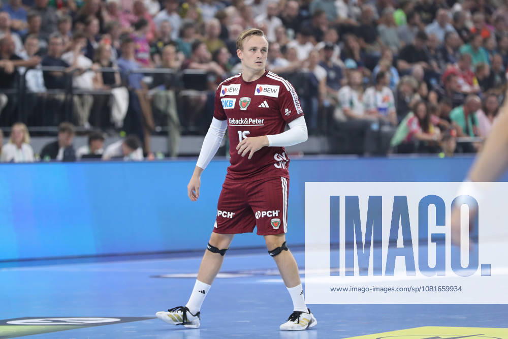 Handball, 2026 Rexel Supercup, SC Magdeburg vs. Füchse Berlin, from left: Tobias Grondahl (Berlin), 15 (Munich)