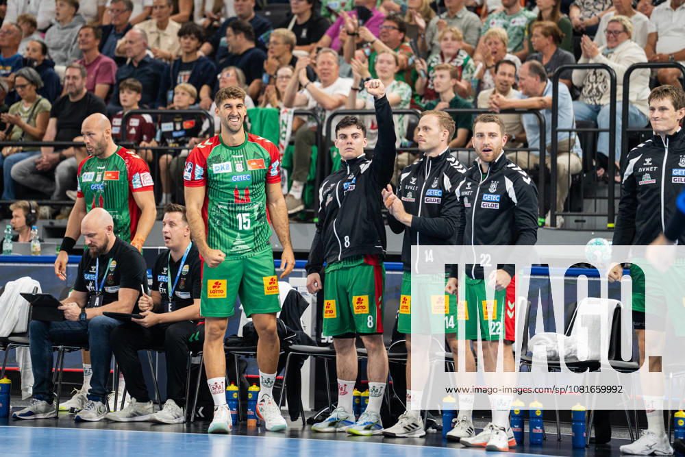 Fuechse Berlin GER vs. SC Magdeburg GER, Handball, Men s Handball Bundesliga 1, 2026 Rexel Supercup, 2026–2027 Season, Munich, August 22, 2026: Antonio Serradilla (SC Magdeburg, 15), Tim Bennet Thielicke (SC Magdeburg, 08, Omar Ingi Magnusson (SC Magdeburg), 14, and Lukas Mertens (SC Magdeburg), 22, celebrate after a save at the SAP Garden in Munich, Germany