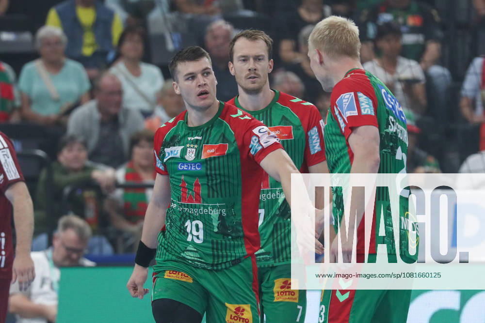 Handball, 2026 Rexel Super Cup, SC Magdeburg vs. Füchse Berlin, from left: Elvar Orn Jonsson (Magdeburg), 19, Felix Claar (Magdeburg), 7, Magnus Saugstrup (Magdeburg), 23, Munich