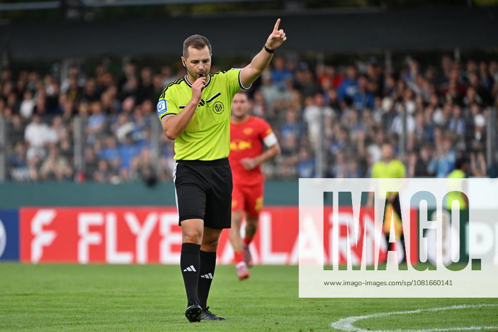 Soccer, DFB Cup, First Round, Eintracht Trier vs. RB Leipzig; Referee Marc Philip Eckermann gives instructions and gestures with his arms; Trier