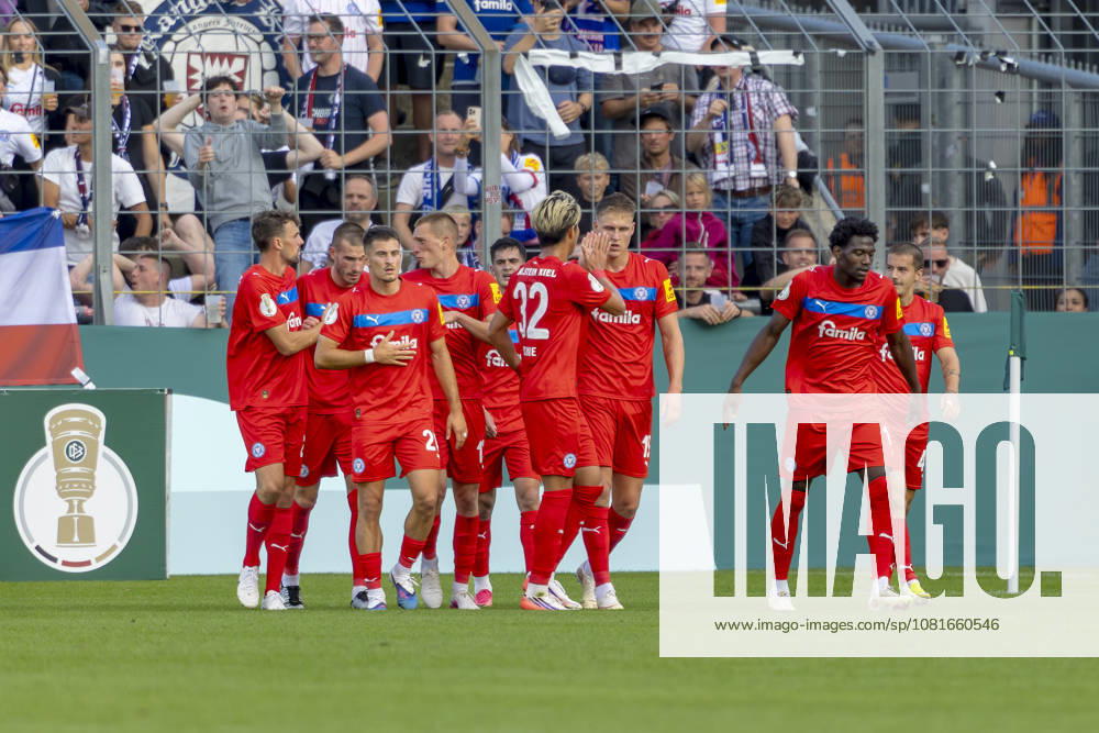 Munich, Germany, August 22, 2026, 2026–2027 DFB Cup, First Round: TSV 1860 Munich vs. Holstein Kiel. Pictured in the crowd, goal scorer Phil Harres of Kiel celebrates with his teammates after scoring the 0–1 goal, DFB and DFL regulations prohibit any use of photographs as image sequences and or quasi-video at Grünwalder Stadium, Bavaria