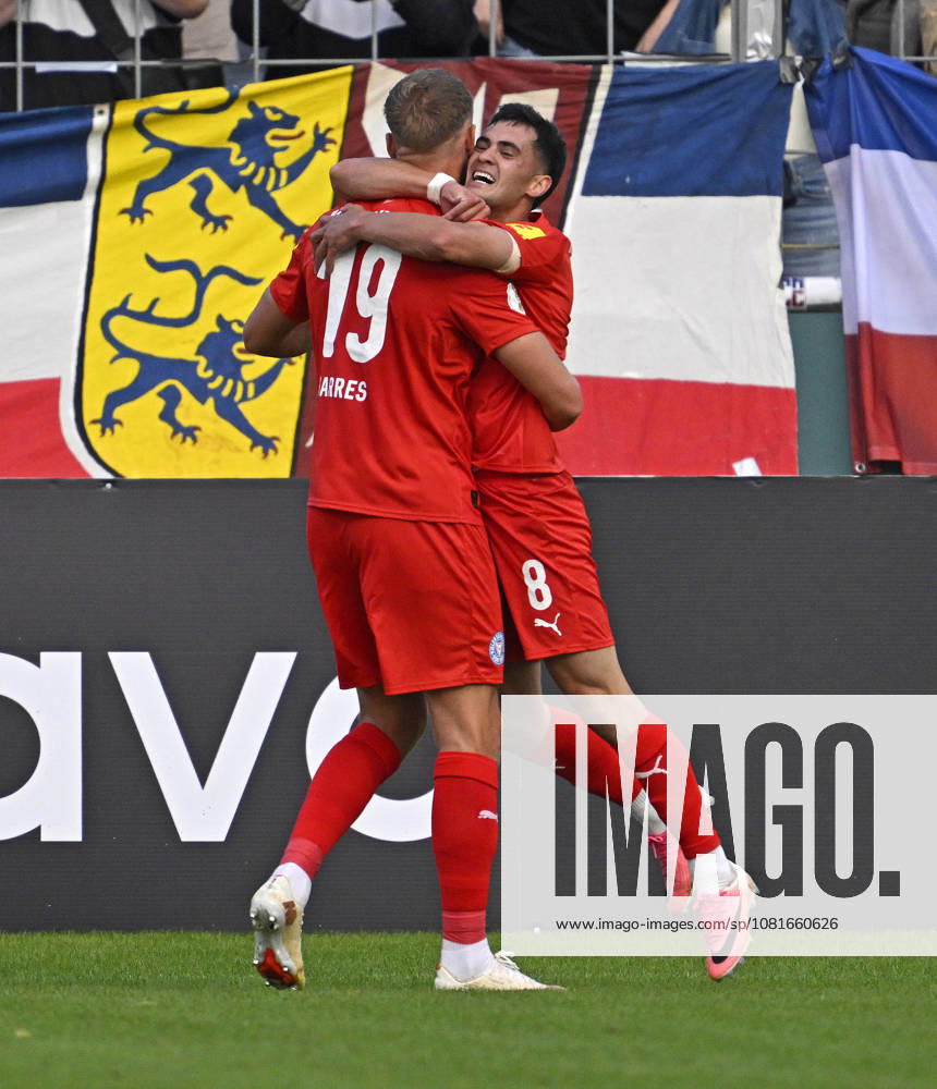 2026-27 DFB Cup, First Round, TSV 1860 Munich vs. Holstein Kiel, at the Stadion an der Grünwalderstrasse in Munich; from left: Phil Harres (Holstein Kiel) and Guillermo Balzi (Holstein Kiel) celebrate