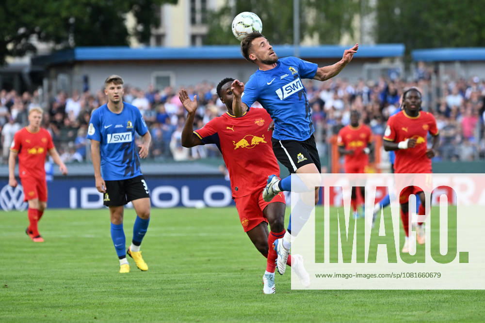 Soccer, DFB Cup First Round, Eintracht Trier vs. RB Leipzig, Ridle Baku, RB Leipzig, Jonas Singer, SV Eintracht Trier 05, tackle, action, battle for the ball, Trier