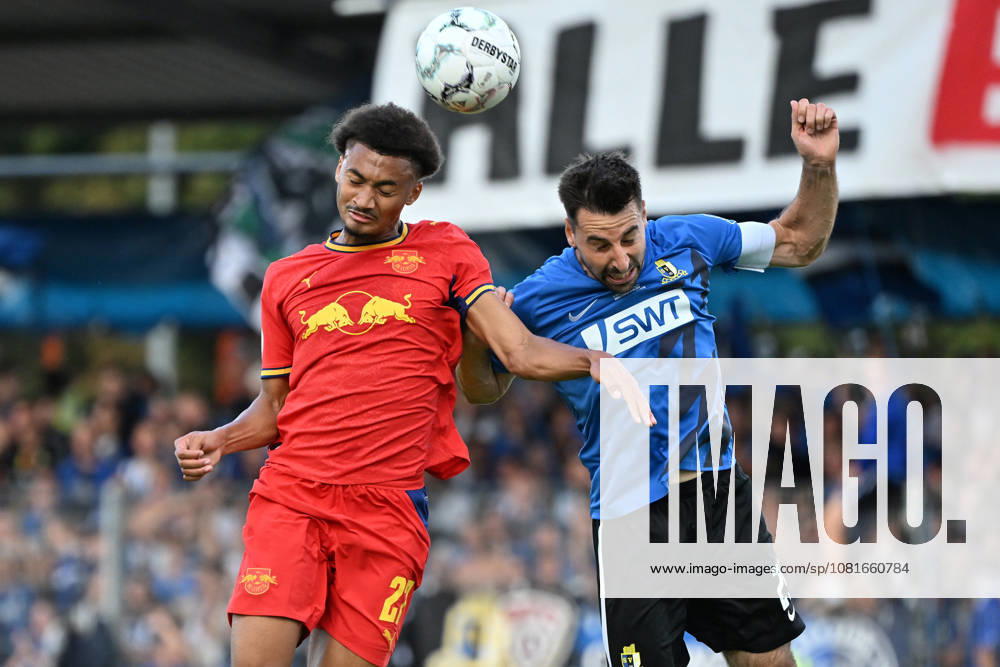 Soccer, DFB Cup, First Round, Eintracht Trier vs. RB Leipzig, Tidiam Gomis (RB Leipzig) vs. Christopher Spang (SV Eintracht Trier 05), tackle, action, battle for the ball, Trier