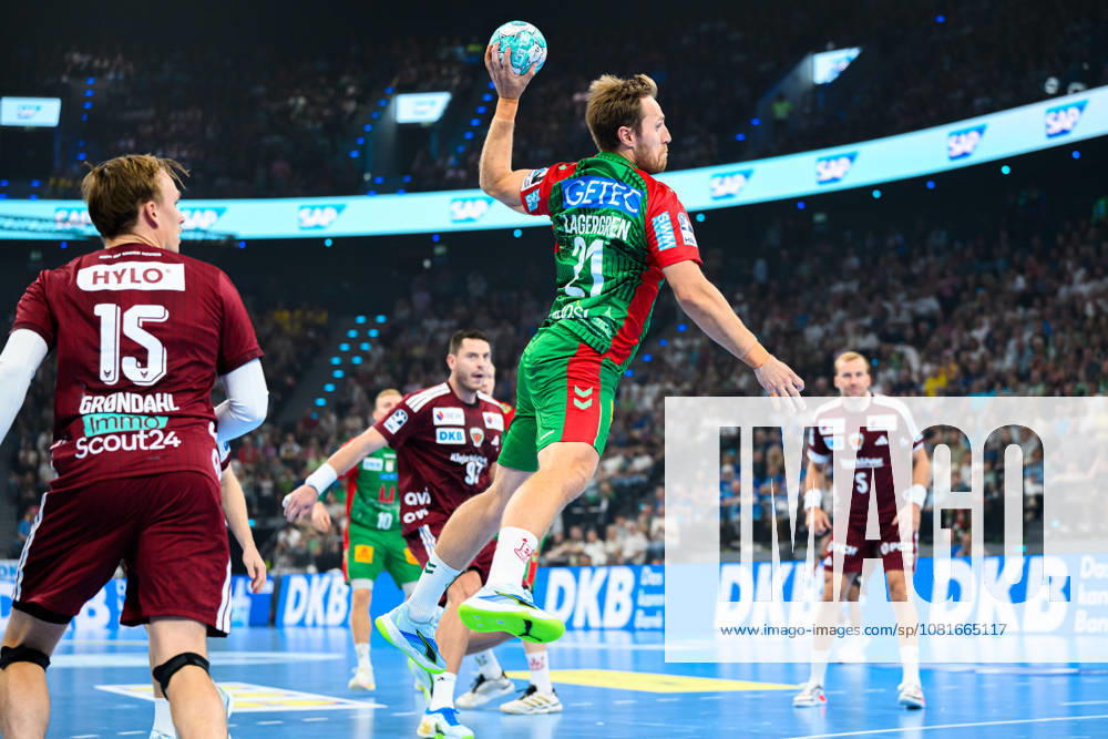 Munich HBL Super Cup 2026 SC Magdeburg vs. Fuechse Berlin; left: Tobias Grondahl (Berlin), Albin Lagergren (SC Magdeburg); Munich SAP Garden, Bavaria, Germany