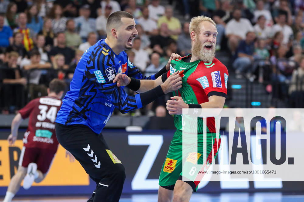 Handball Rexel Super Cup, SC Magdeburg vs. Füchse Berlin, from left: Matej Mandic (Magdeburg), 12, Matthias Musche (Magdeburg), 6, cheering, goal celebration, celebrating the goal, Munich