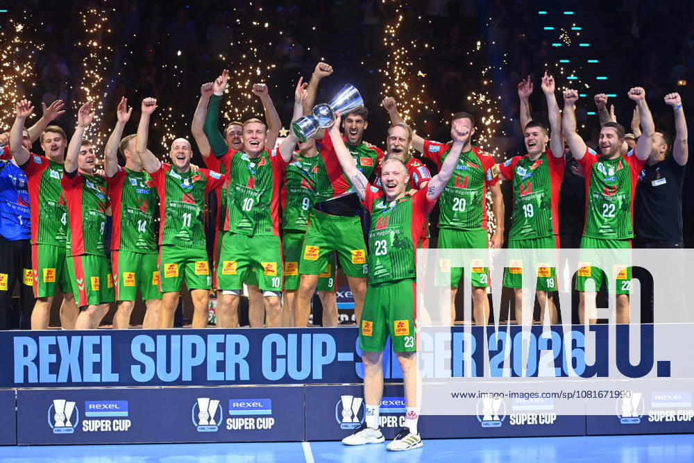 Award Ceremony: Magnus SAUGSTRUP, SC Magdeburg, with trophy, cup, player, team photo, team, squad, team photo, celebration,joy, excitement, handball Rexel Super Cup 2026 (men’s) SC Magdeburg vs. Füchse Berlin 38–30 on August 22, 2026, SAP GARDEN, Munich