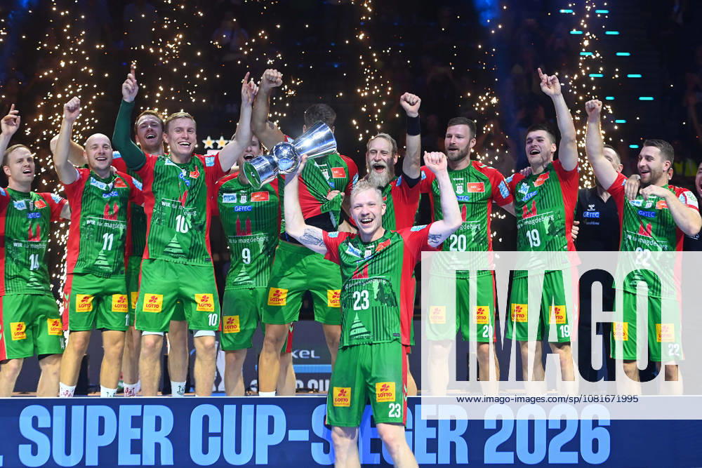 Award Ceremony: Magnus SAUGSTRUP, SC Magdeburg, with trophy, cup, player, team photo, team, squad, team photo, celebration,joy, excitement, handball Rexel Super Cup 2026 (men’s) SC Magdeburg vs. Füchse Berlin 38–30 on August 22, 2026, SAP GARDEN, Munich