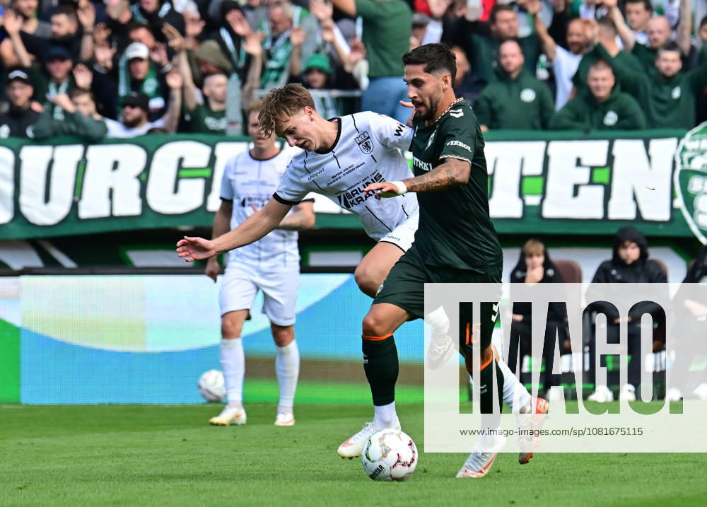 German Soccer, Men, DFB Cup, 1st Round, 2026–2027 Season, Hamburg, Lüneburger SK vs. Werder Bremen: Nevio Scheuer (Lüneburg, No. 18) tries to get past Ludovit Reis (Werder, No. 15). DFB and DFL regulations prohibit any use of photographs as image sequences and or quasi-video. Hamburg Millerntorstadion, Hamburg, Germany