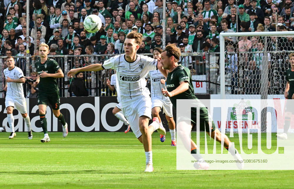 German Soccer, Men s, DFB Cup, 1st Round, 2026–2027 Season, Hamburg, Lüneburger SK vs. Werder Bremen: Tjark Dörr (Lüneburg 20) tries to get past Olivier Deman (Werder 02). DFB and DFL regulations prohibit any use of photographs as image sequences and or quasi-video. Hamburg Millerntorstadion, Hamburg, Germany