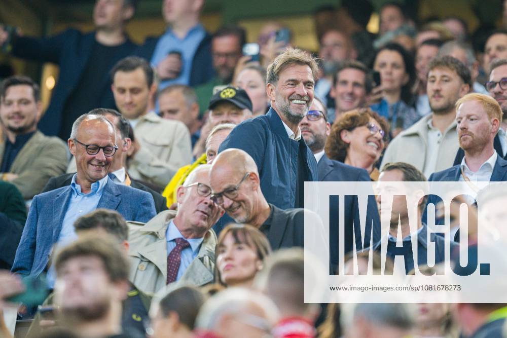 Soccer, 2026–2027, Franz Beckenbauer Super Cup, Borussia Dortmund vs. FC Bayern Munich; L: Friedrich Merz, Federal Chancellor; Jürgen Klopp, national team coach, in the stands. DFB regulations prohibit any use of photographs as image sequences and or quasi-video.