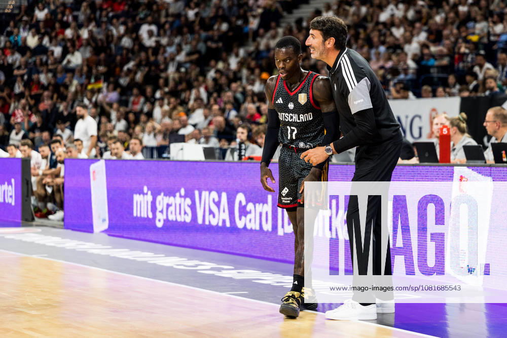 Alex Mumbru (Head Coach Germany) talking to Dennis Schroeder (Schröder, Schroder, Germany, 17) during the Turkish Airlines Basketball Supercup final match between Germany vs. Croatia at Barclays Arena on August 22, 2026 in Hamburg, Germany. Hamburg Germany