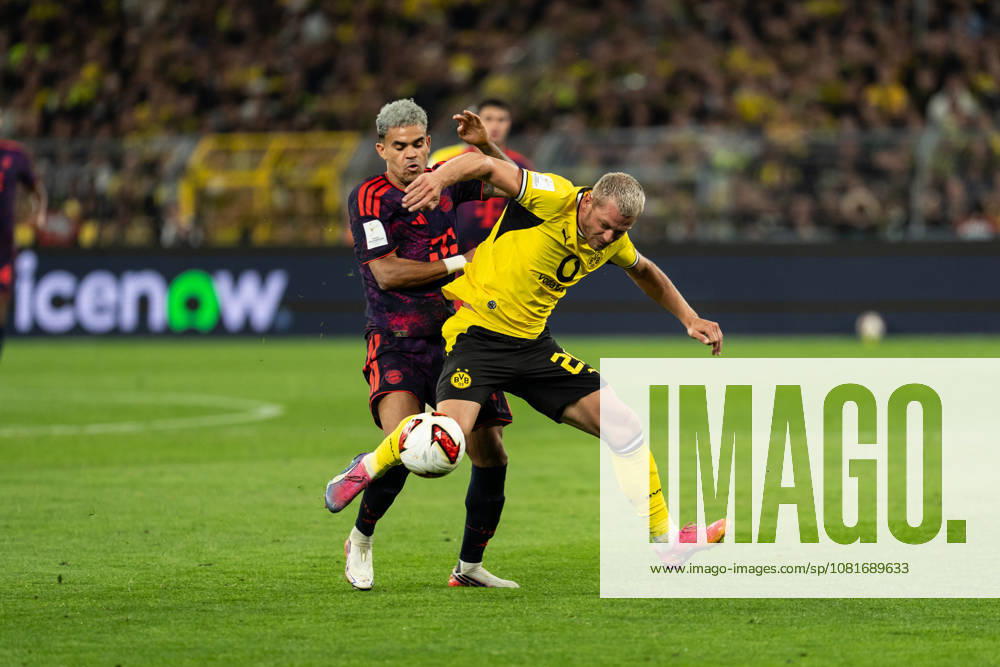 GER Germany, Soccer, 2026–2027 season, Franz Beckenbauer Super Cup: Borussia Dortmund vs. FC Bayern Munich, head-to-head matchup between Julian Ryerson (Borussia Dortmund, 26) and Luis Diaz (FC Bayern Munich, 14), Dortmund, Signal Iduna Park, North Rhine-Westphalia (NRW), Germany