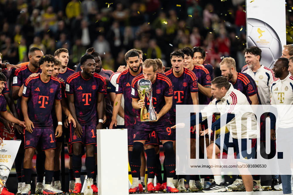 GER Germany, Soccer, 2026–2027 Season, Franz Beckenbauer Super Cup: Borussia Dortmund vs. FC Bayern Munich, Franz Beckenbauer Super Cup Winner 2026, FC Bayern Munich, Winners Photo, Harry Kane (FC Bayern Munich) kisses the trophy at Signal Iduna Park in Dortmund, North Rhine-Westphalia (NRW), Germany