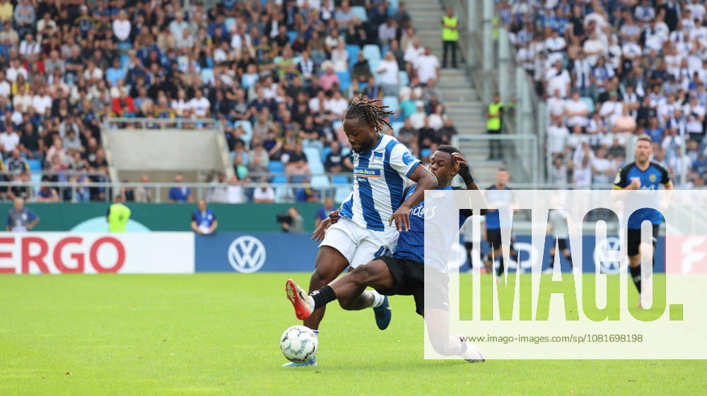 Soccer DFB Cup 1st Round, 1. FC Saarbrücken vs. Hertha BSC Berlin – Deyovaisio Zeefuik (Hertha BSC) vs. Abdenego Nankishi (1. FC Saarbrücken) – tackle, action, battle for the ball. DFL and DFB regulations prohibit any use of photographs as image sequences and or quasi-video. Saarbrücken