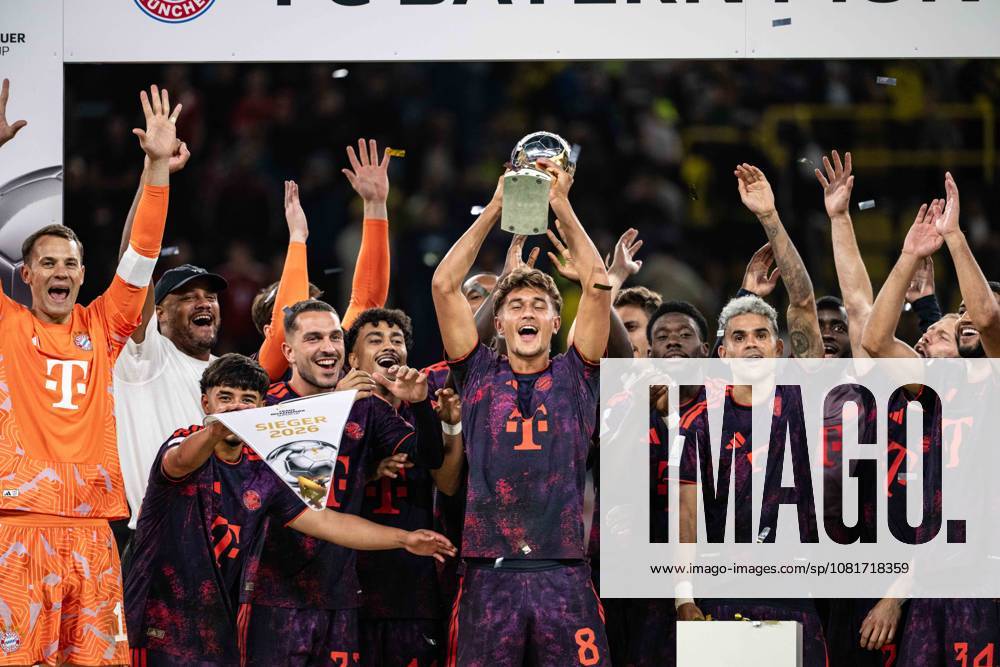 Tom Bischof 8 FC Bayern Munich with the trophy, Borussia Dortmund vs. FC Bayern Munich, soccer, Franz Beckenbauer Super Cup, August 22, 2026. DFB regulations prohibit any use of photographs as image sequences and or quasi-video. Dortmund, North Rhine-Westphalia, Germany