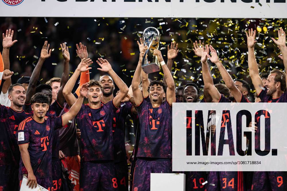 Nathaniel Brown 11 FC Bayern Munich with the trophy, Borussia Dortmund vs. FC Bayern Munich, soccer, Franz Beckenbauer Super Cup, August 22, 2026. DFB regulations prohibit any use of photographs as image sequences and or quasi-video. Dortmund, North Rhine-Westphalia, Germany