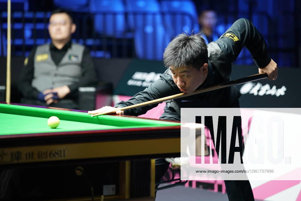 Gao Yang of China plays a shot in the first round match against Guan Zhen of China on day 1 of Wuhan Open 2026 at the Optics Valley Gymnasium of Huazhong University of Science and Technology on August 23, 2026 in Wuhan, Hubei Province of China.