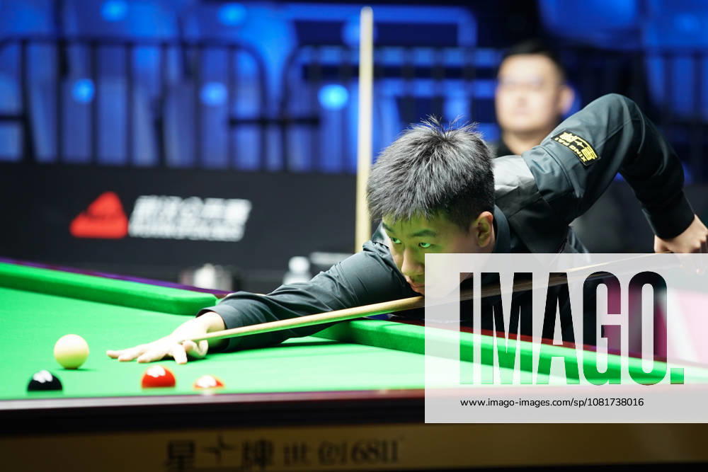 Gao Yang of China plays a shot in the first round match against Guan Zhen of China on day 1 of Wuhan Open 2026 at the Optics Valley Gymnasium of Huazhong University of Science and Technology on August 23, 2026 in Wuhan, Hubei Province of China.