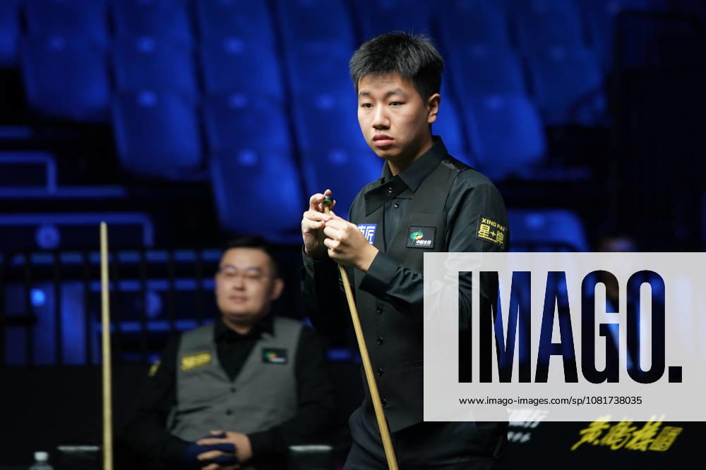 Gao Yang of China chalks the cue in the first round match against Guan Zhen of China on day 1 of Wuhan Open 2026 at the Optics Valley Gymnasium of Huazhong University of Science and Technology on August 23, 2026 in Wuhan, Hubei Province of China.