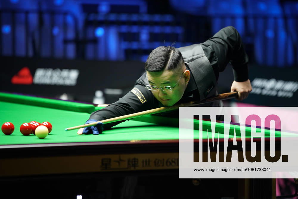 Guan Zhen of China plays a shot in the first round match against Gao Yang of China on day 1 of Wuhan Open 2026 at the Optics Valley Gymnasium of Huazhong University of Science and Technology on August 23, 2026 in Wuhan, Hubei Province of China.