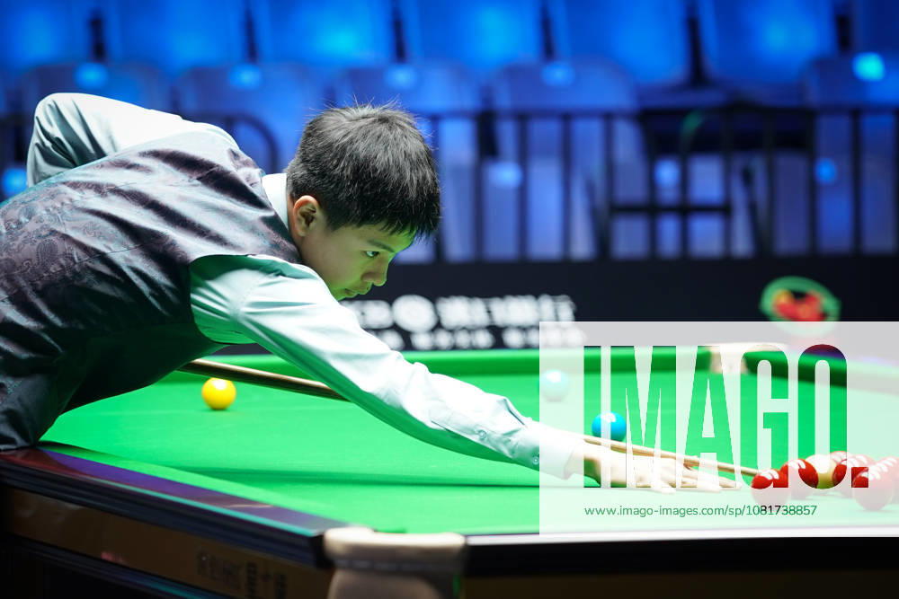 Wang Xinzhong of China plays a shot in the first round match against Ben Mertens of Belgium on day 1 of Wuhan Open 2026 at the Optics Valley Gymnasium of Huazhong University of Science and Technology on August 23, 2026 in Wuhan, Hubei Province of China.