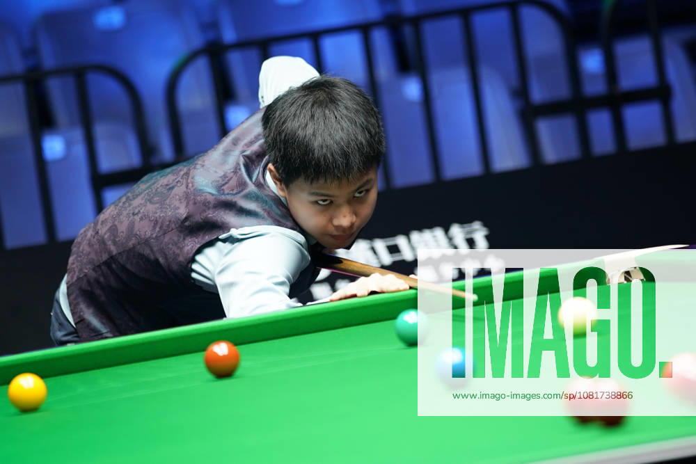 Wang Xinzhong of China plays a shot in the first round match against Ben Mertens of Belgium on day 1 of Wuhan Open 2026 at the Optics Valley Gymnasium of Huazhong University of Science and Technology on August 23, 2026 in Wuhan, Hubei Province of China.