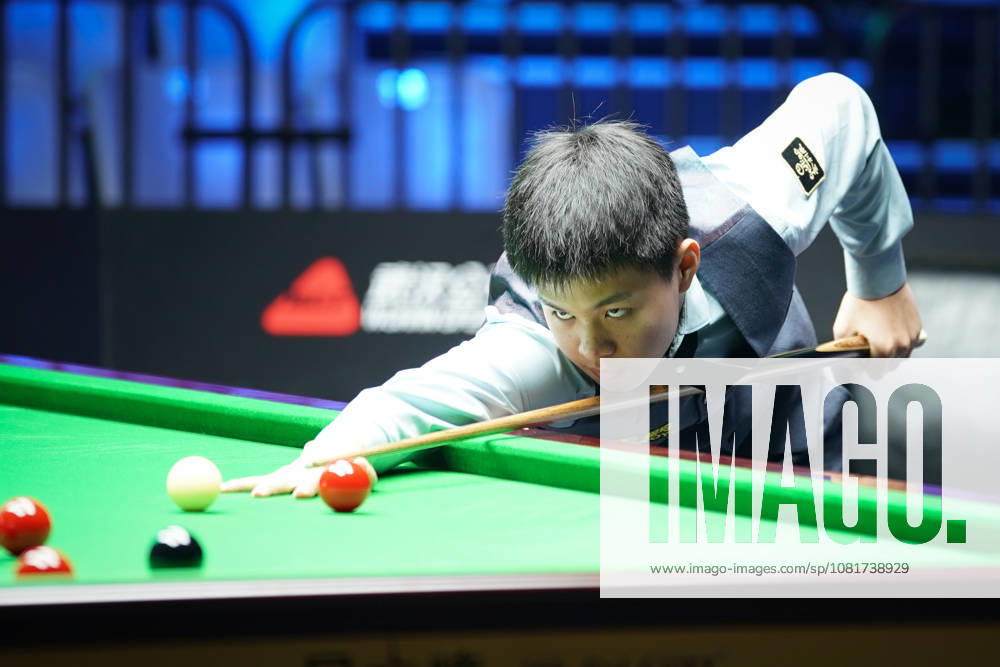 Wang Xinzhong of China plays a shot in the first round match against Ben Mertens of Belgium on day 1 of Wuhan Open 2026 at the Optics Valley Gymnasium of Huazhong University of Science and Technology on August 23, 2026 in Wuhan, Hubei Province of China.