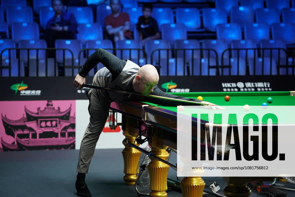 Chris Wakelin of England plays a shot in the first round match against Jordan Brown of Northern Ireland on day 1 of Wuhan Open 2026 at the Optics Valley Gymnasium of Huazhong University of Science and Technology on August 23, 2026 in Wuhan, Hubei Province of China.