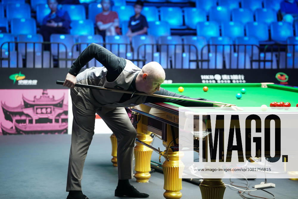 Chris Wakelin of England plays a shot in the first round match against Jordan Brown of Northern Ireland on day 1 of Wuhan Open 2026 at the Optics Valley Gymnasium of Huazhong University of Science and Technology on August 23, 2026 in Wuhan, Hubei Province of China.