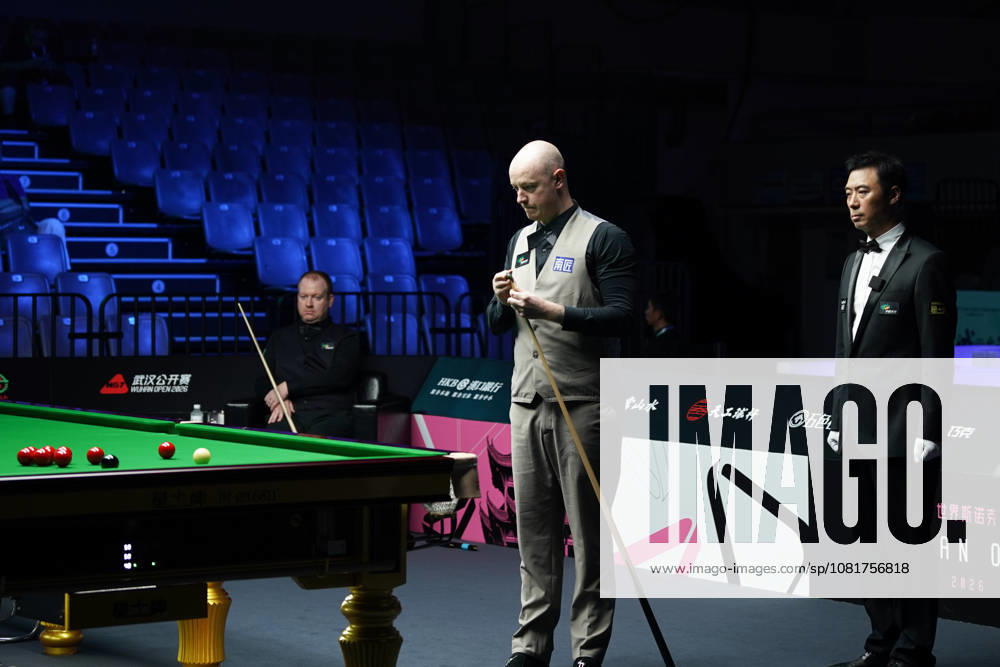 Chris Wakelin of England chalks the cue in the first round match against Jordan Brown of Northern Ireland on day 1 of Wuhan Open 2026 at the Optics Valley Gymnasium of Huazhong University of Science and Technology on August 23, 2026 in Wuhan, Hubei Province of China.