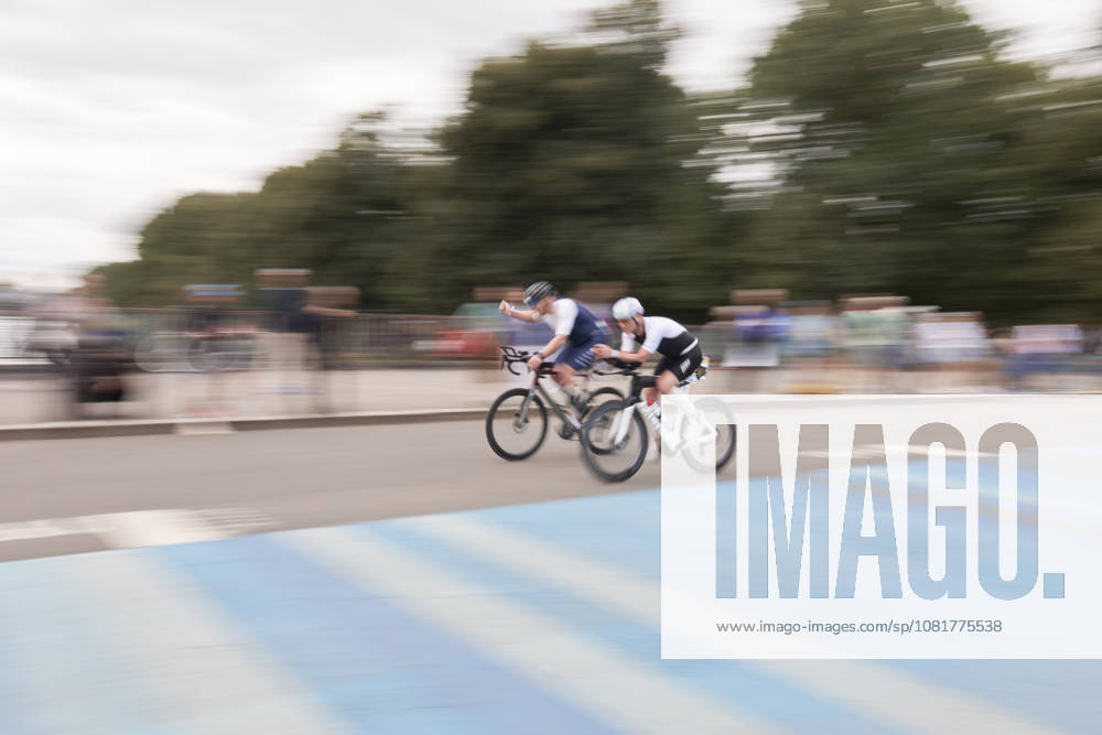 IRONMAN 70.3 Leipzig 2026 Cycling Segment, Sachsenbrücke: Athletes at the IRONMAN 70.3 Leipzig on August 23, 2026, during the cycling leg. The half-distance race consists of a 1.9-kilometer swim, a 90-kilometer bike ride, and a 21.1-kilometer run, and is part of the international IRONMAN 70.3 series
