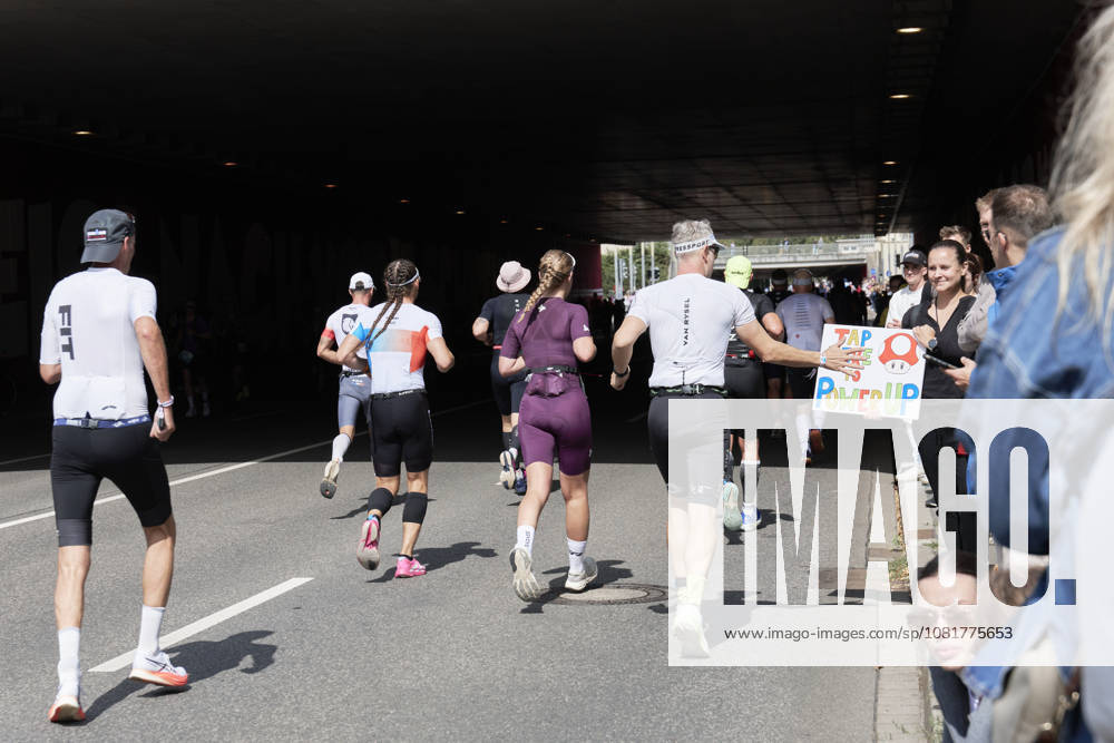IRONMAN 70.3 Leipzig 2026 Running Segment: Athletes at the Sportforum during the IRONMAN 70.3 Leipzig on August 23, 2026, while running. The half-distance race consists of a 1.9-kilometer swim, a 90-kilometer bike ride, and a 21.1-kilometer run, and is part of the international IRONMAN 70.3 series