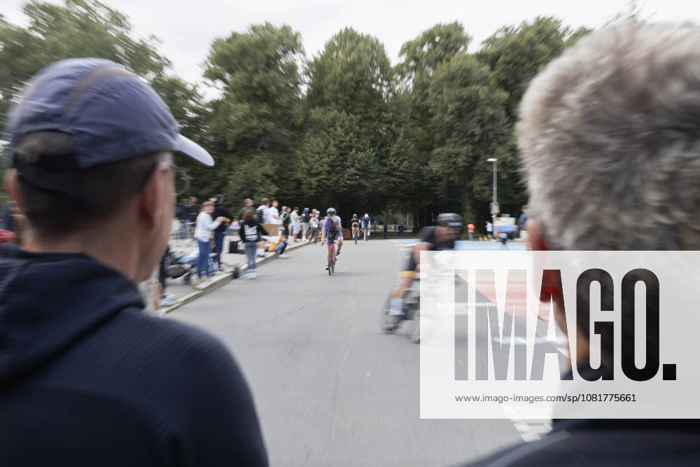 IRONMAN 70.3 Leipzig 2026 Cycling Segment, Sachsenbrücke: Athletes at the IRONMAN 70.3 Leipzig on August 23, 2026, during the cycling portion. The half-distance race consists of a 1.9-kilometer swim, a 90-kilometer bike ride, and a 21.1-kilometer run, and is part of the international IRONMAN 70.3 series