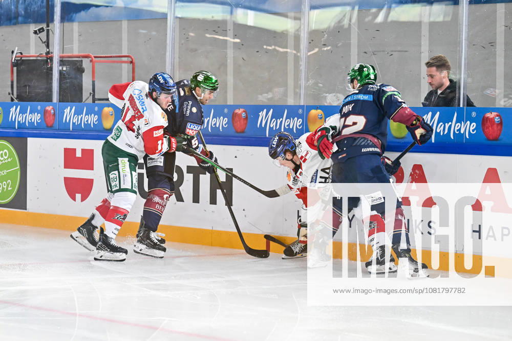 Dolomites Cup 2026 Eisbären Berlin vs. Augsburger Panther August 23, 2026 NEUMARKT, ITALY August 23, from left: D. J. BUSDEKER (Augsburger Panther) 14, Mitch REINKE (Eisbären Berlin) 5, Jimmy LAMBERT, Augsburg Panthers 23, and Eric MIC, Eisbären Berlin 12, during the exhibition game between the Eisbären Berlin and the Augsburg Panthers at the Dolomite Cup in the Würth Arena in Neumarkt