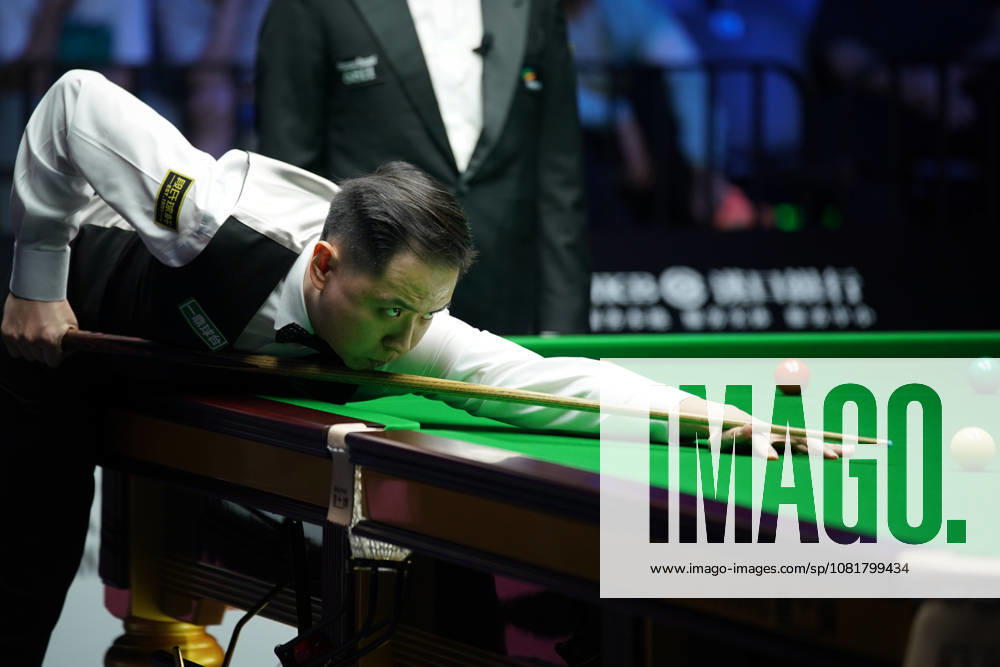 Xiao Guodong of China plays a shot during his 5-0 victory against Wang Xinbo of China in the round of 64 at the 2026 Wuhan Open on August 23, 2026 in Wuhan, Hubei Province of China.