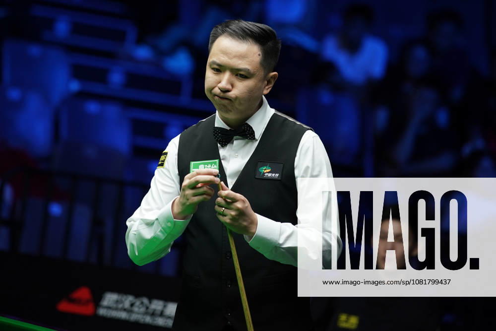 Xiao Guodong of China plays a shot during his 5-0 victory against Wang Xinbo of China in the round of 64 at the 2026 Wuhan Open on August 23, 2026 in Wuhan, Hubei Province of China.