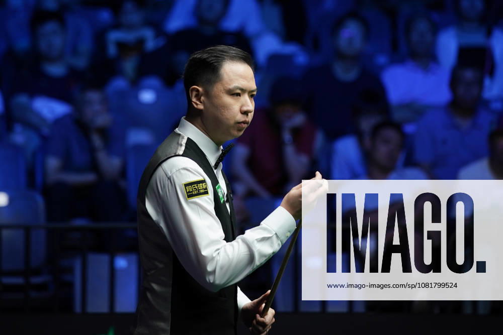 Xiao Guodong of China plays a shot during his match against Wang Xinbo of China in the round of 64 at the 2026 Wuhan Open on August 23, 2026 in Wuhan, Hubei Province of China. Xiao Guodong defeated Wang Xinbo 5-0 to advance to the next round.