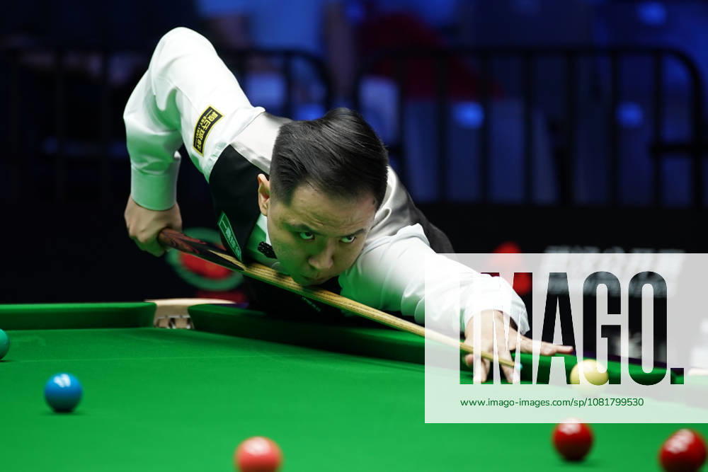 Xiao Guodong of China plays a shot during his round of 64 match against Wang Xinbo of China at the 2026 Wuhan Open on August 23, 2026 in Wuhan, Hubei Province of China. Xiao defeated Wang 5-0 to advance to the round of 32.