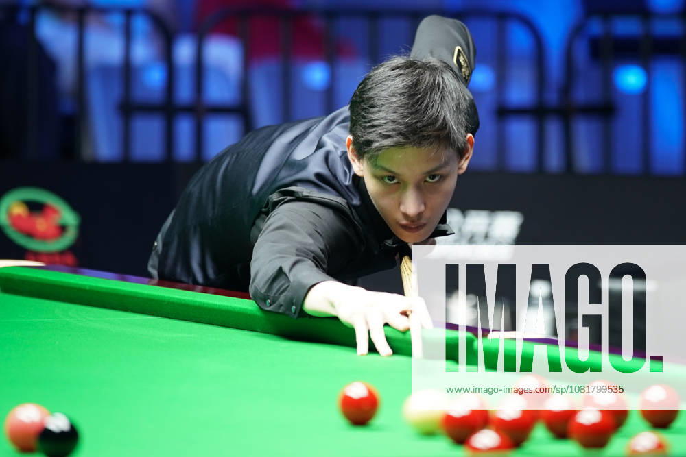 Wang Xinbo of China plays a shot during his match against Xiao Guodong of China in the round of 64 at the 2026 Wuhan Open on August 23, 2026 in Wuhan, Hubei Province of China. Xiao Guodong defeated Wang Xinbo 5-0 to advance to the next round.