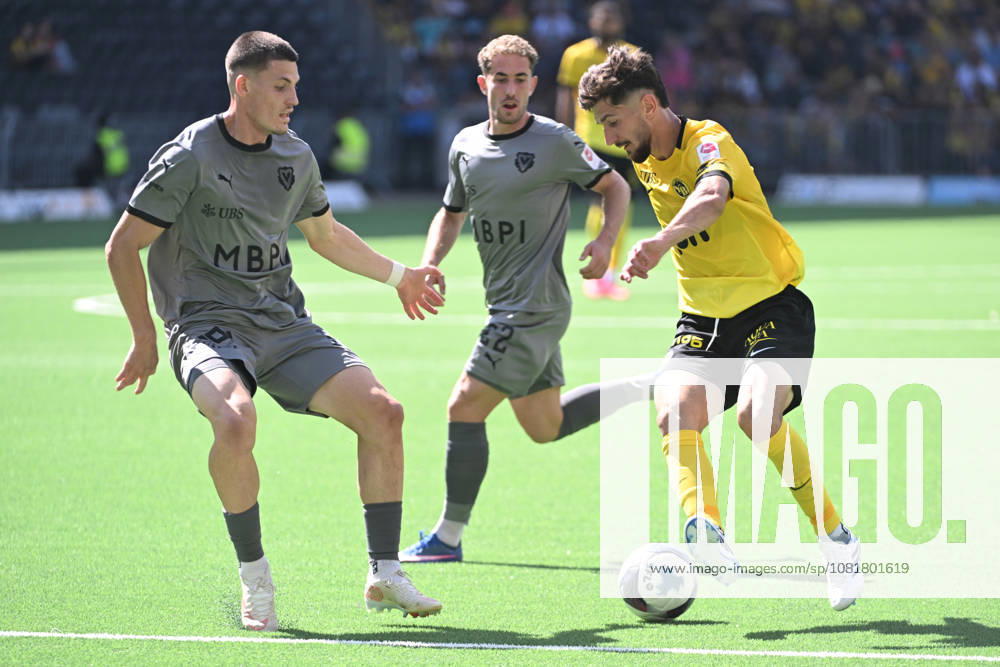BERN, SWITZERLAND, AUGUST 23: Armin Gigovic of Young Boys (r) faces off against Daniel Kasper of Vaduz (l) and Mischa Eberhard of Vaduz (c) during the Swiss Super League match between BSC Young Boys and FC Vaduz at Wankdorf Stadium on August 23, 2026 in Bern, Switzerland; Bern; Wankdorf Stadium; Bern; Switzerland