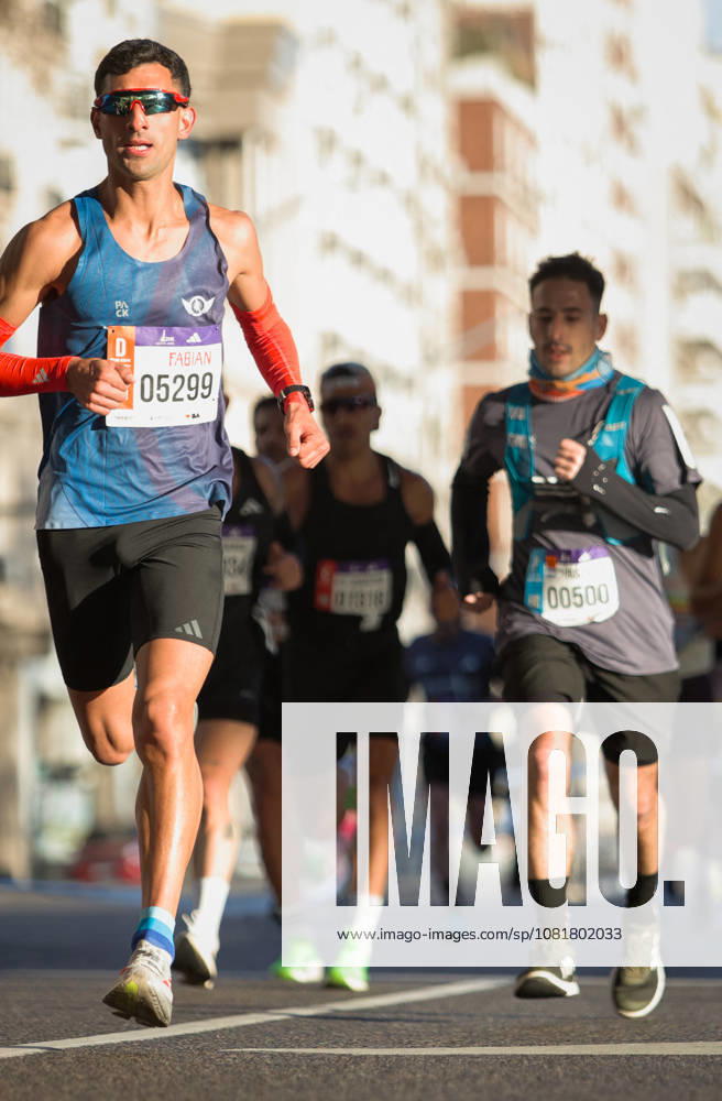 TRACK AND FIELD - Marathon - Buenos Aires 21K Half Marathon Photo by IPA ABACAPRESS.COM87731725 - Runners at the 21K Buenos Aires Half Marathon particPhoto by IPA ABACAPRESS.COMting in the street race in Argentina. Buenos Aires Argentina