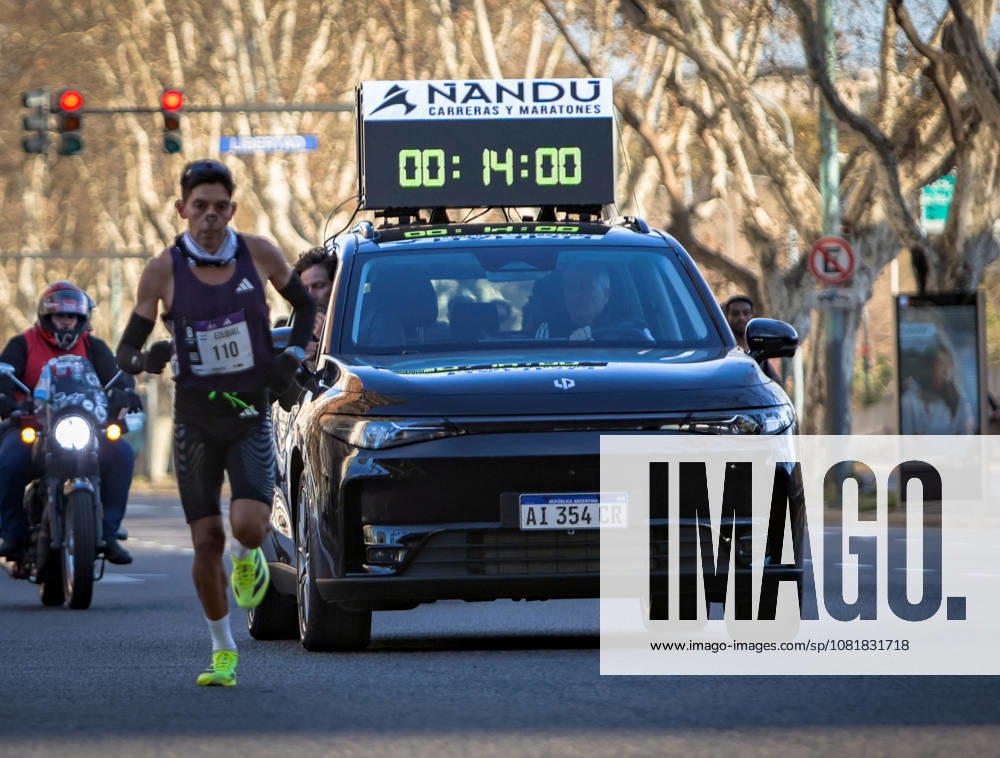 TRACK AND FIELD - Marathon - Buenos Aires 21K Half Marathon Photo by IPA ABACAPRESS.COM87736128 - Runners at the 21K Buenos Aires Half Marathon particPhoto by IPA ABACAPRESS.COMting in the street race in Argentina. Buenos Aires Argentina