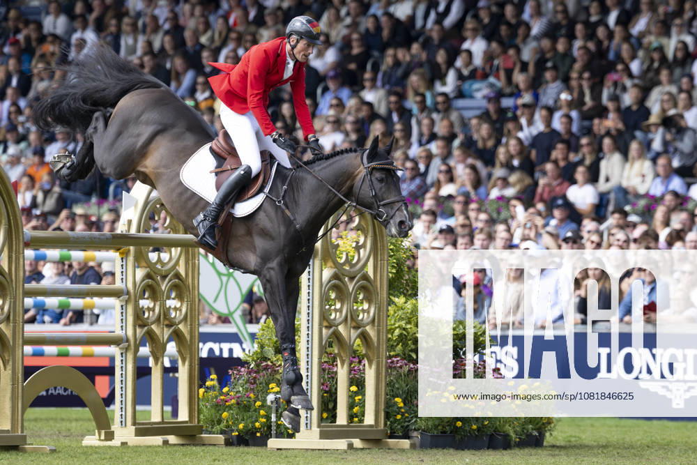 Daniel DEUSSER (GER) on Otello de Guldenboom, in flight, single frame, individual action, in Jumping S3, Round A, FEI Jumping World Championship Individual Final LONGINES Prize, on August 23, 2026, FEI World Equestrian Championships Aachen 2026, August 11–23, 2026, in Aachen, Germany Â