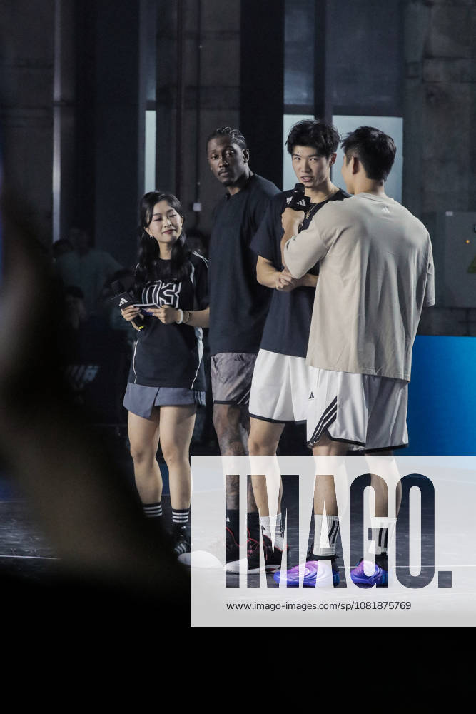 Jalen Williams of the Oklahoma City Thunder speaks to media during his 2026 NBA, Basketball Herren, USA China Tour on August 23, 2026 in Shanghai, China. Williams is pictured with Chinese basketball player Xie Liyongwei during an interview.