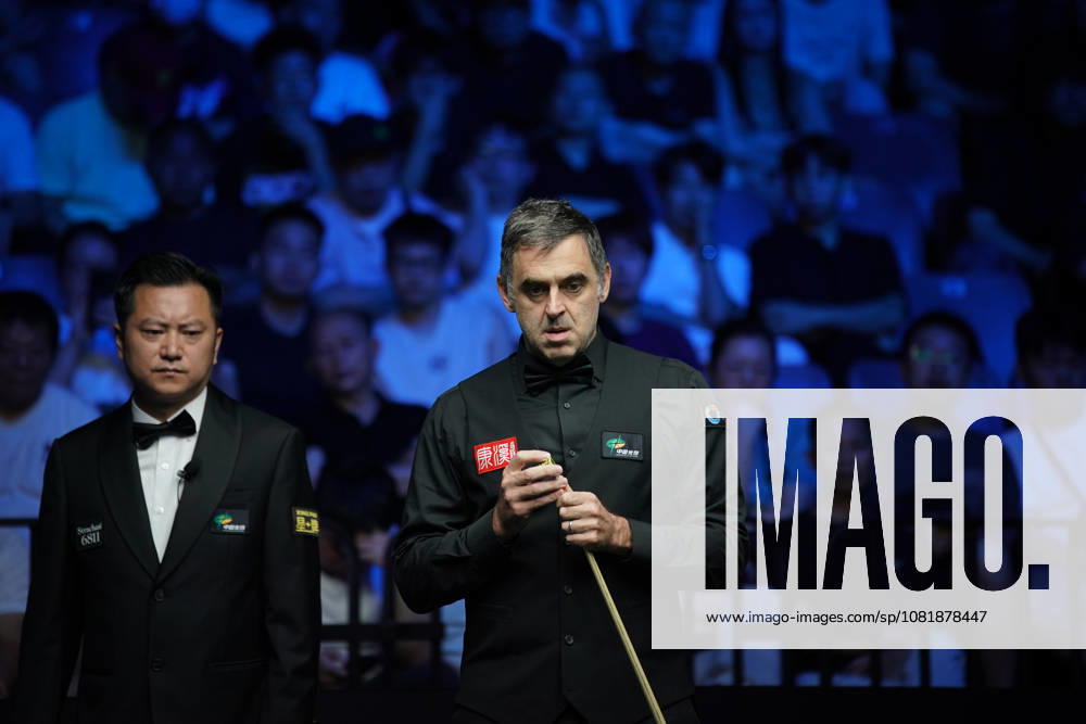 Ronnie O Sullivan of England chalks the cue in the second round match against Ashley Carty of England on day 2 of Wuhan Open 2026 at the Optics Valley Gymnasium of Huazhong University of Science and Technology on August 24, 2026 in Wuhan, Hubei Province of China.