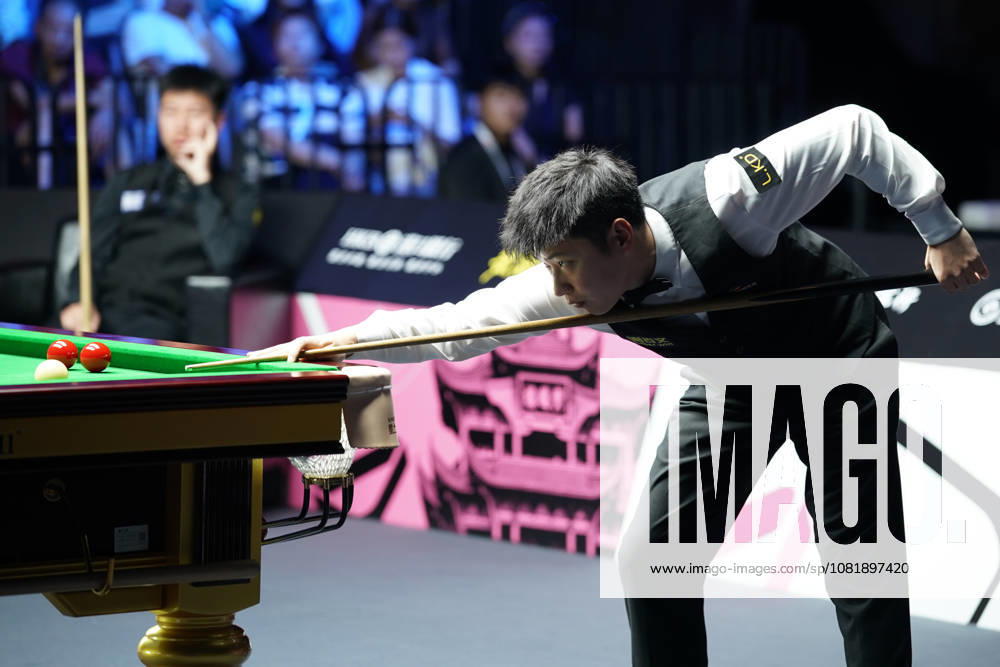 Zhao Xintong of China plays a shot in the second round match against Gao Yang of China on day 2 of Wuhan Open 2026 at the Optics Valley Gymnasium of Huazhong University of Science and Technology on August 24, 2026 in Wuhan, Hubei Province of China.