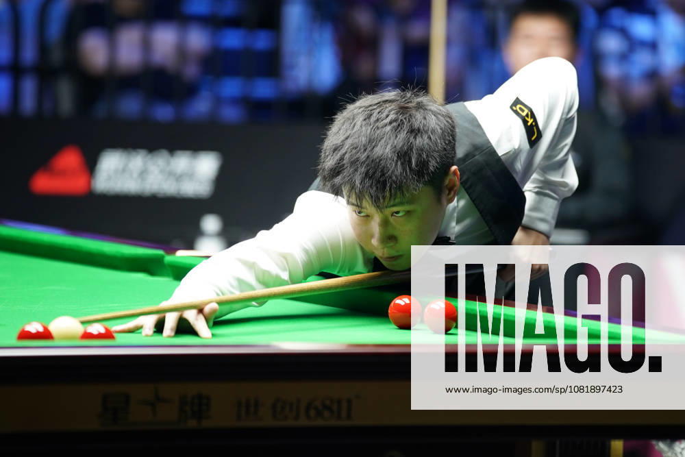 Zhao Xintong of China plays a shot in the second round match against Gao Yang of China on day 2 of Wuhan Open 2026 at the Optics Valley Gymnasium of Huazhong University of Science and Technology on August 24, 2026 in Wuhan, Hubei Province of China.